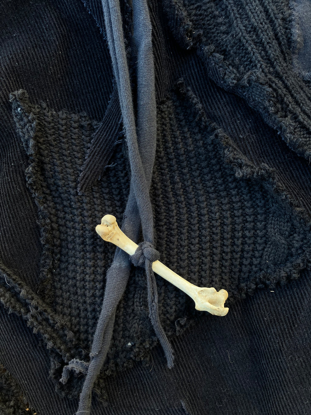 skirt with bones, shells & bells