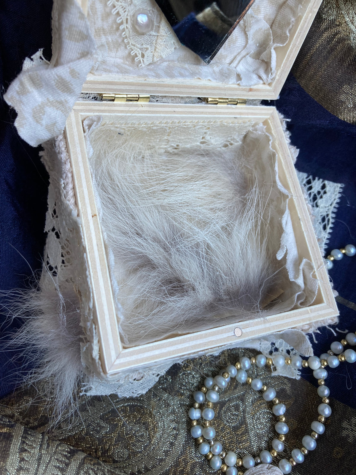 wooden jewelry box with coyote pelt, mirrors & pearls