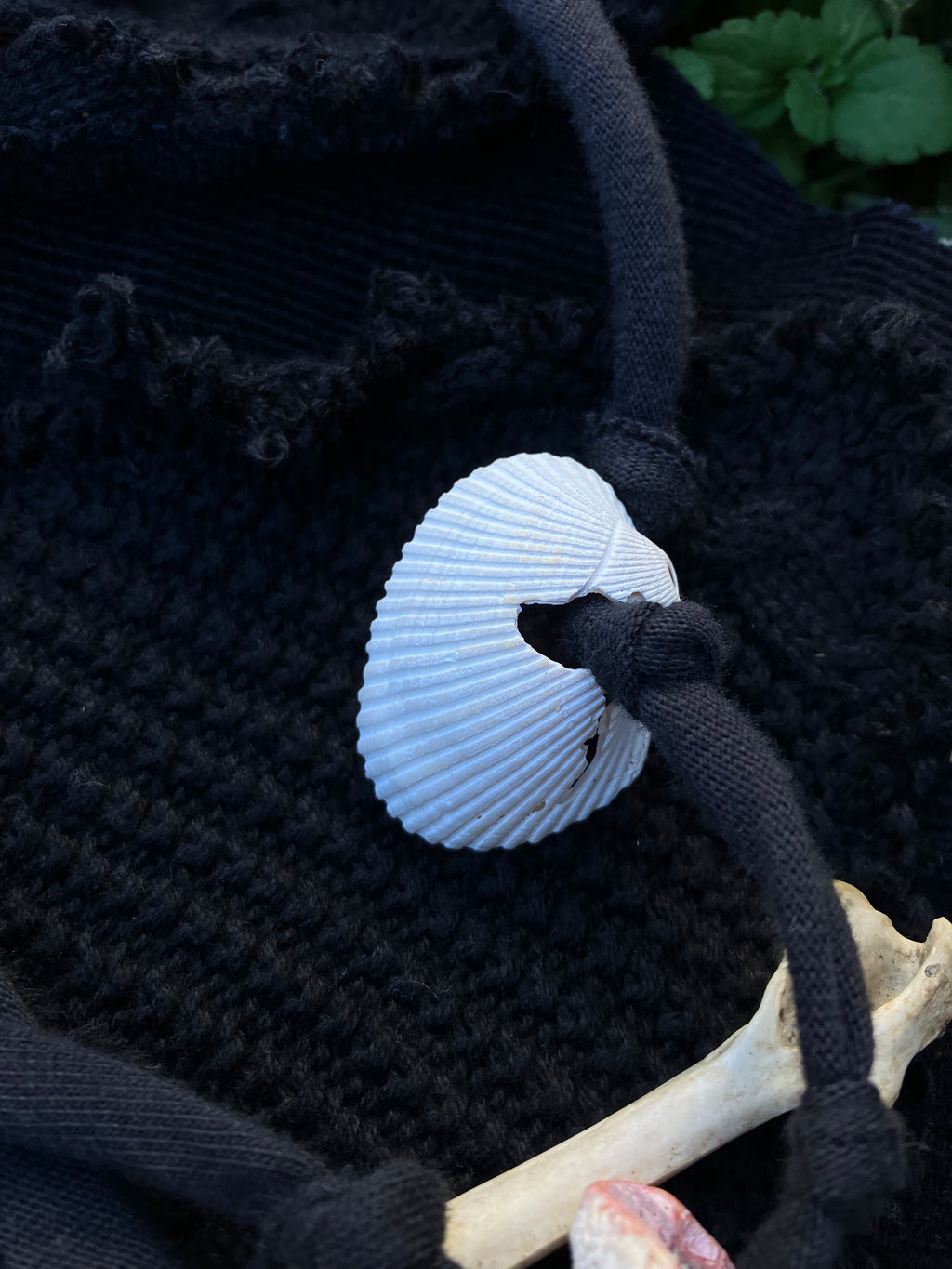 skirt with bones, shells & bells