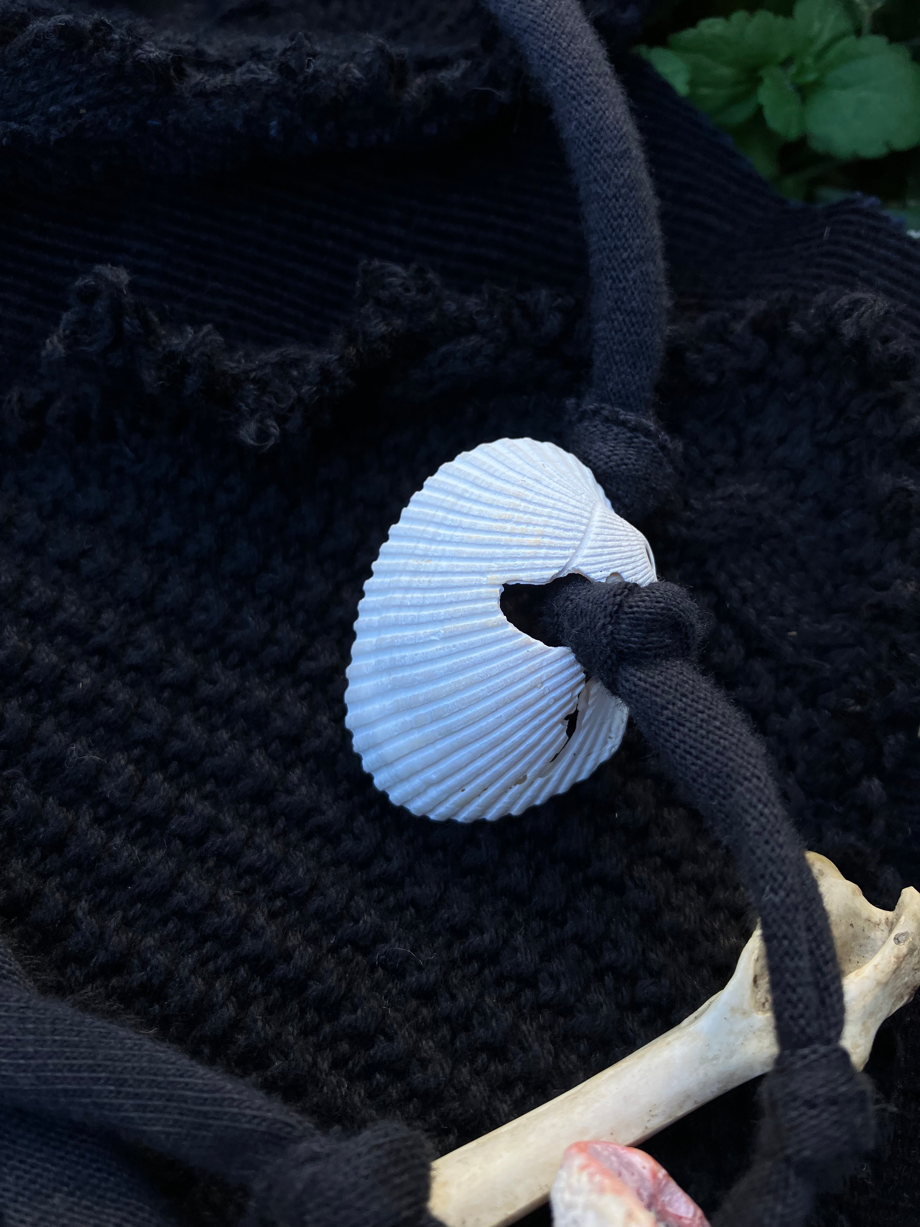 skirt with bones, shells & bells