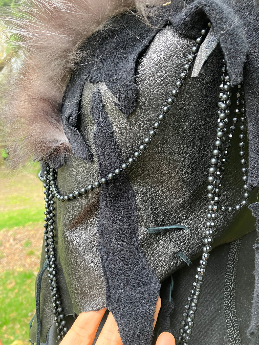 silver fox fur leather top w/ turkey feathers & beads