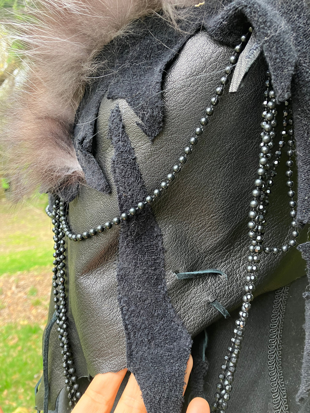 silver fox fur leather top w/ turkey feathers & beads