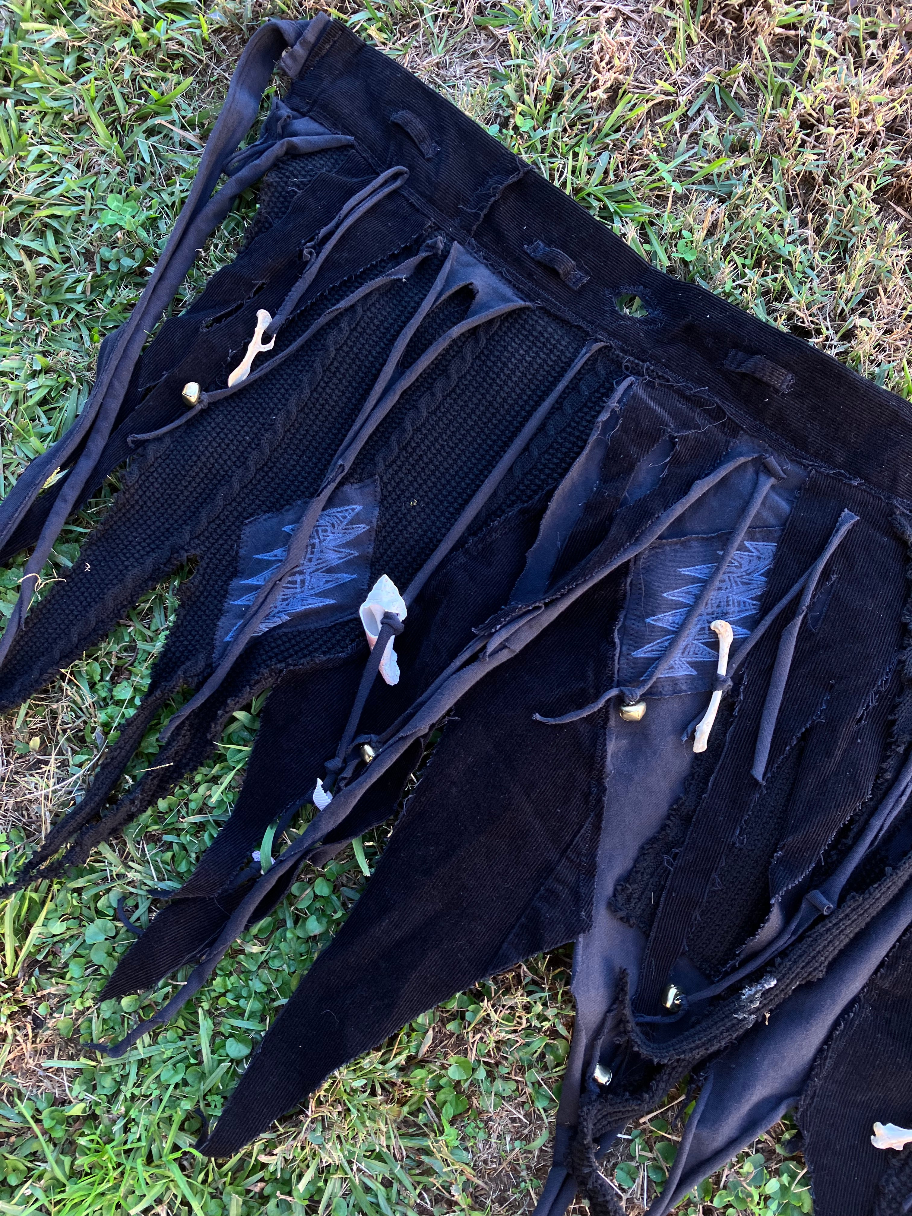 skirt with bones, shells & bells