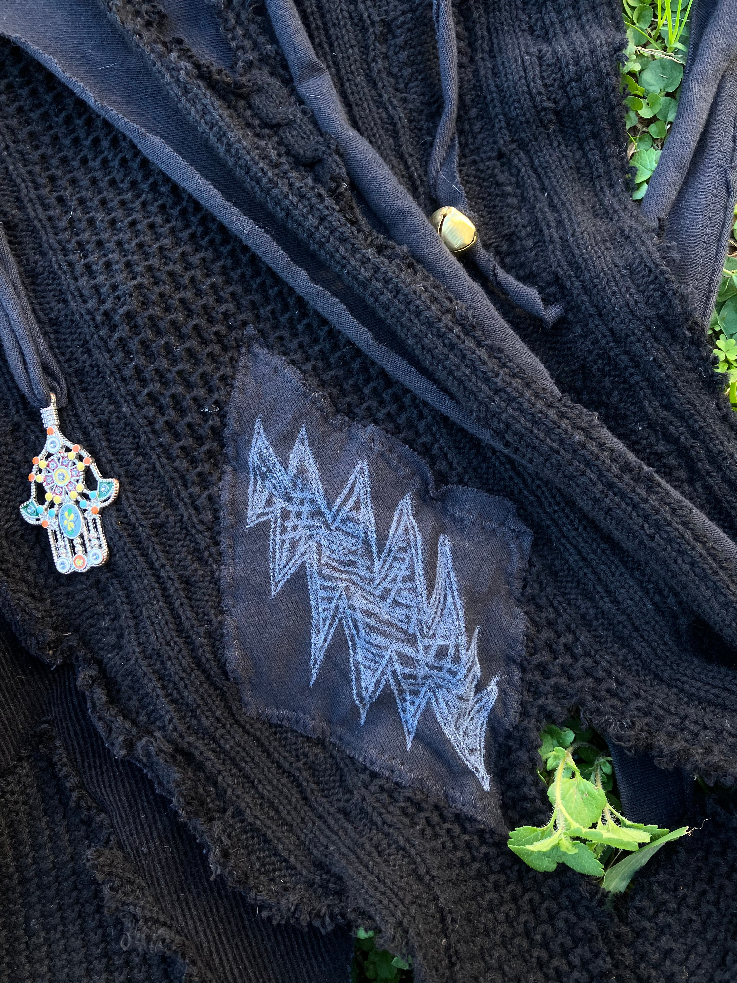 skirt with bones, shells & bells