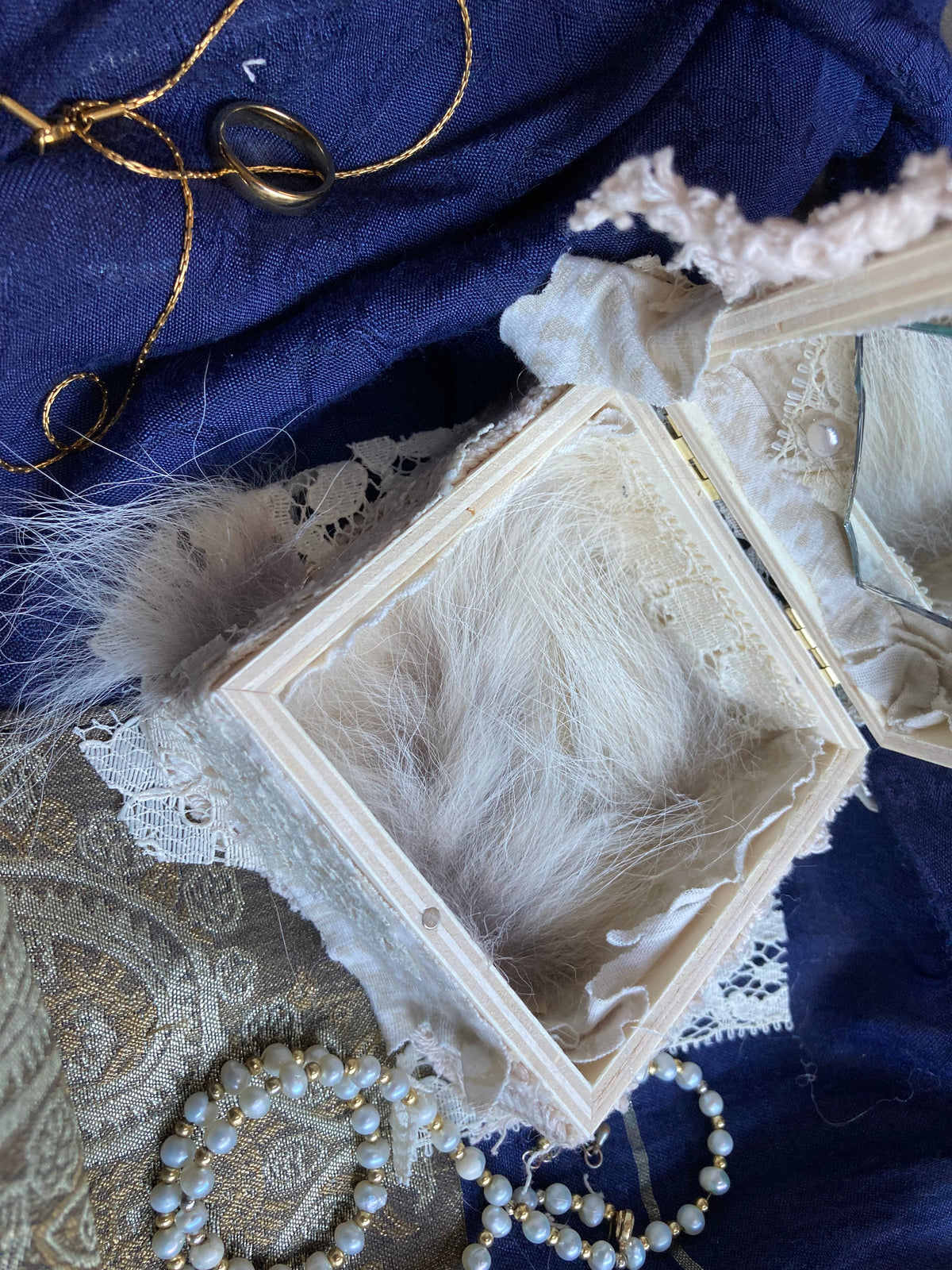 wooden jewelry box with coyote pelt, mirrors & pearls